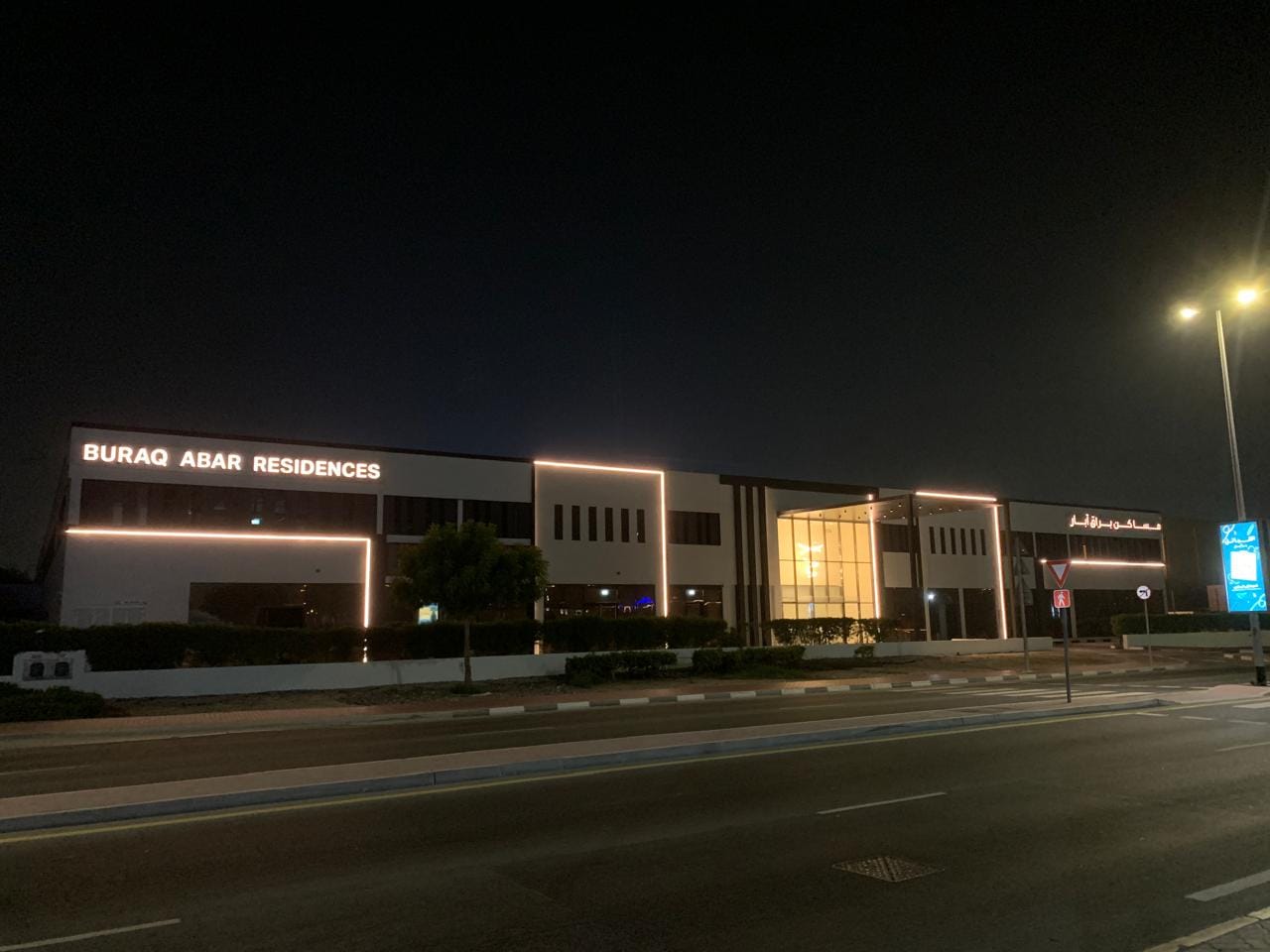 Night exterior with warm façade lighting