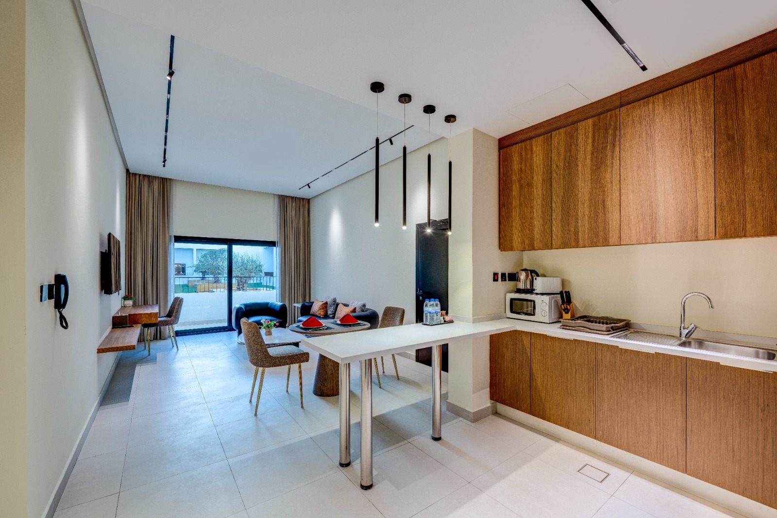 Interior of a Buraq Abar residence with open living and kitchen